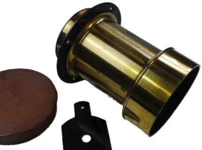 Derogy Brass lens (Estimated 20-22 Inches Focal Length) with Slot For Waterhouse Stops (1 modern plastic Waterhouse Stop included), with built-in lens hood, flange & Red Leather front cap