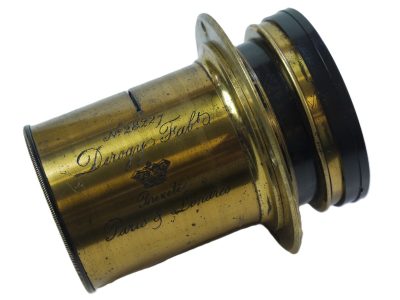 Derogy Aplanat No.4 Brass lens (Estimated 16 inch focal length) with Slot for Waterhouse Stops (No Stops Including), with flange & modern rear cap. Height is 85mm. Diameter is 60mm