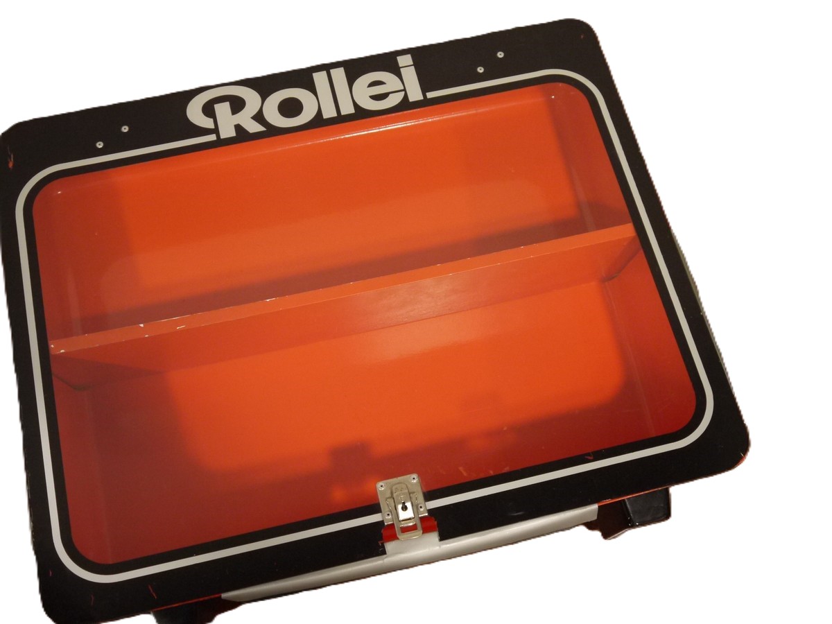 mwclassiccameras-20251030-323 Rollei Plastic Display Cabinet, Orange & Black coloured, with one wooden shelf & removable Clear front panel. 590 x 480 x 150mm