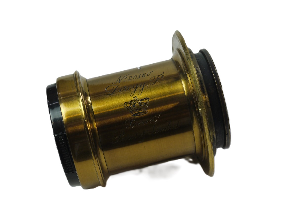 mwclassiccameras-20251030-44 Derogy No.3 Brass lens (Estimated 10 inch focal length) with Slot for Waterhouse Stops (No Stops included). With flange. Height is 60mm. Diameter is 45mm