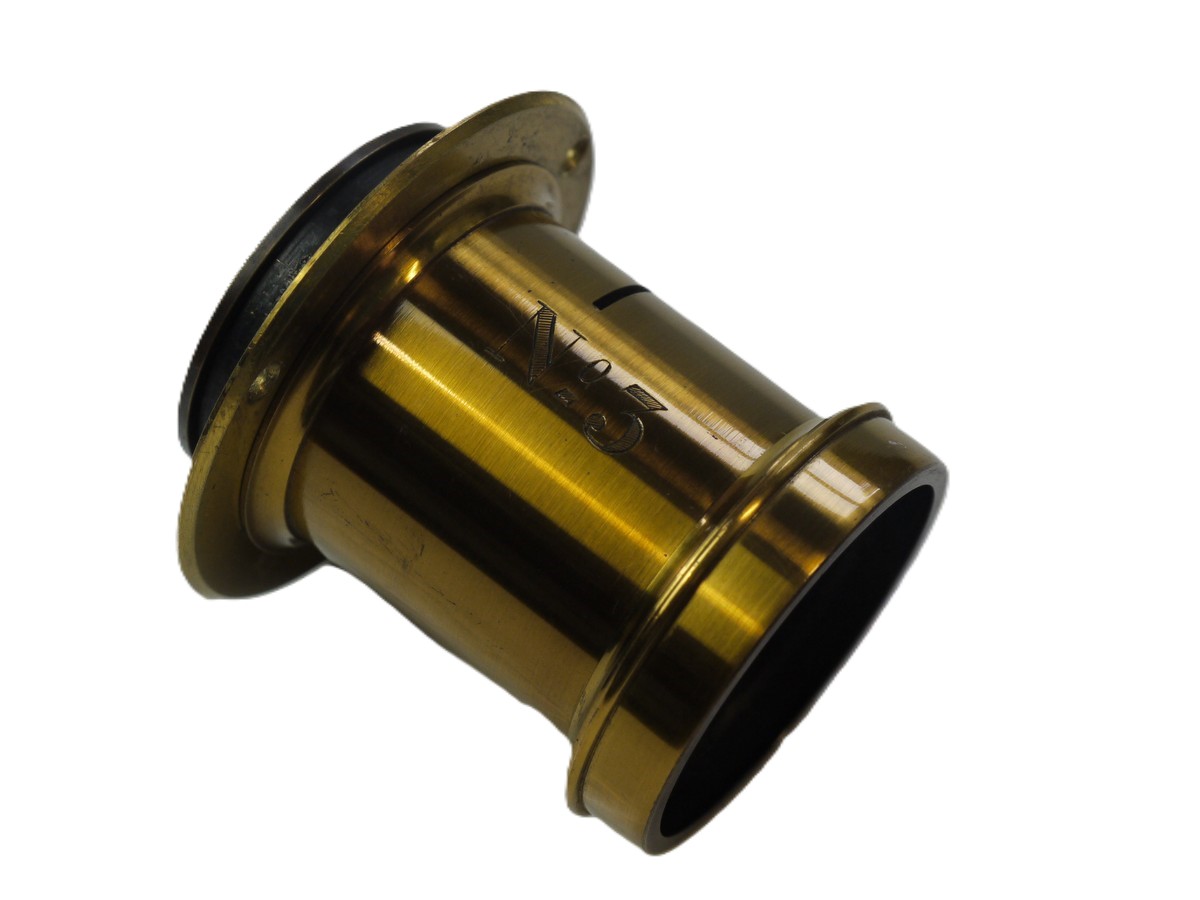 mwclassiccameras-20251030-45 Derogy No.3 Brass lens (Estimated 10 inch focal length) with Slot for Waterhouse Stops (No Stops included). With flange. Height is 60mm. Diameter is 45mm