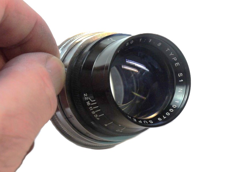 mwclassiccameras-20251114-139 Super Cine Retro 50mm f1.8 Type S1 DELUXE VERSION, Leica M mount lens (No.100078). Claimed to be made from FRENCH SOURCED GLASS in China as a replica of the Angenieux 50mm f1.8 Type S1 Rare lens. With Lens hood, front & rear caps, Numbered Certificate, leather case & Box. From a Limited Production of a few hundred only