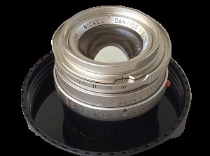 mwc20251226-142 Mandler 35mm f2 7-Element NICKEL Leica M Mount lens (No. 064/100) Limited Edition of 100 only. With Front Cap, Keeper Case, Square Black lens Hood (12526), Round Chrome Lens Hood with Vents (12504), UVa Filter, All Boxed & with Lens Outer Box