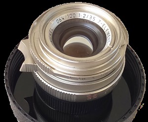 mwc20251226-144 Mandler 35mm f2 7-Element NICKEL Leica M Mount lens (No. 064/100) Limited Edition of 100 only. With Front Cap, Keeper Case, Square Black lens Hood (12526), Round Chrome Lens Hood with Vents (12504), UVa Filter, All Boxed & with Lens Outer Box