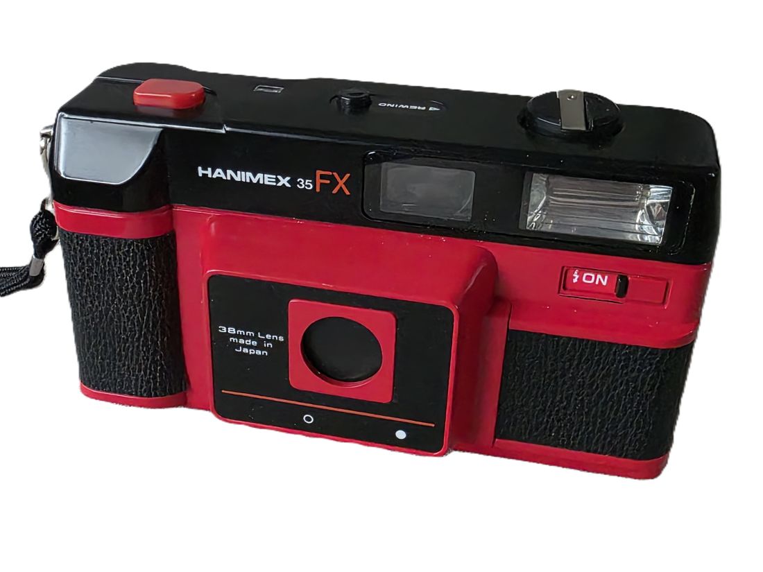 mwc20260109-161 Hanimex 35 FX Red coloured 35mm Compact Point-&-Shoot camera with 38mm lens + Wrist Strap