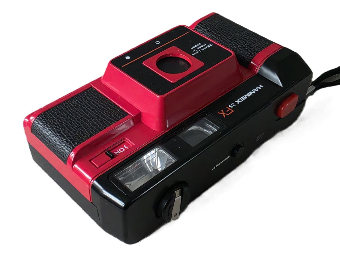 mwc20260109-163 Hanimex 35 FX Red coloured 35mm Compact Point-&-Shoot camera with 38mm lens + Wrist Strap