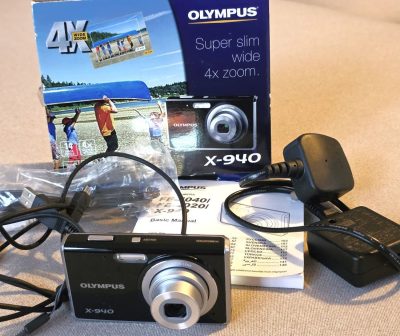 Olympus X940 14 MP Digital Compact camera, black, with 4.7-18.6mm f2.6-5.9 4X Optical Zoom + Battery, Charger, lead, Wrist Strap, Instructions & Box