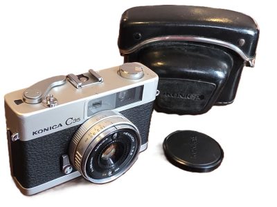 Konica C35 35mm CDS metered Coupled Rangefinder camera, chrome, with 35mm f2.8 Hexanon lens +front cap & ER case