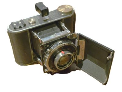 Korelle 6x4.5 on 120 4-strut folding camera with front hinging door, with 7.5cm f2.9 Radionar lens in Compur shutter.UNCOMMON