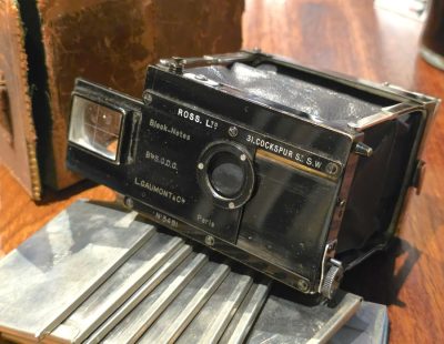 Gaumont Block Notes 6x4.5 Plate camera, 4-strut collapsible design, with set of 12 Plate holders & a 35mm Film back (back slides onto the camera back after the hinging metal retaining bar is removed, With makers case, Front is inscribed "Ross Ltd"