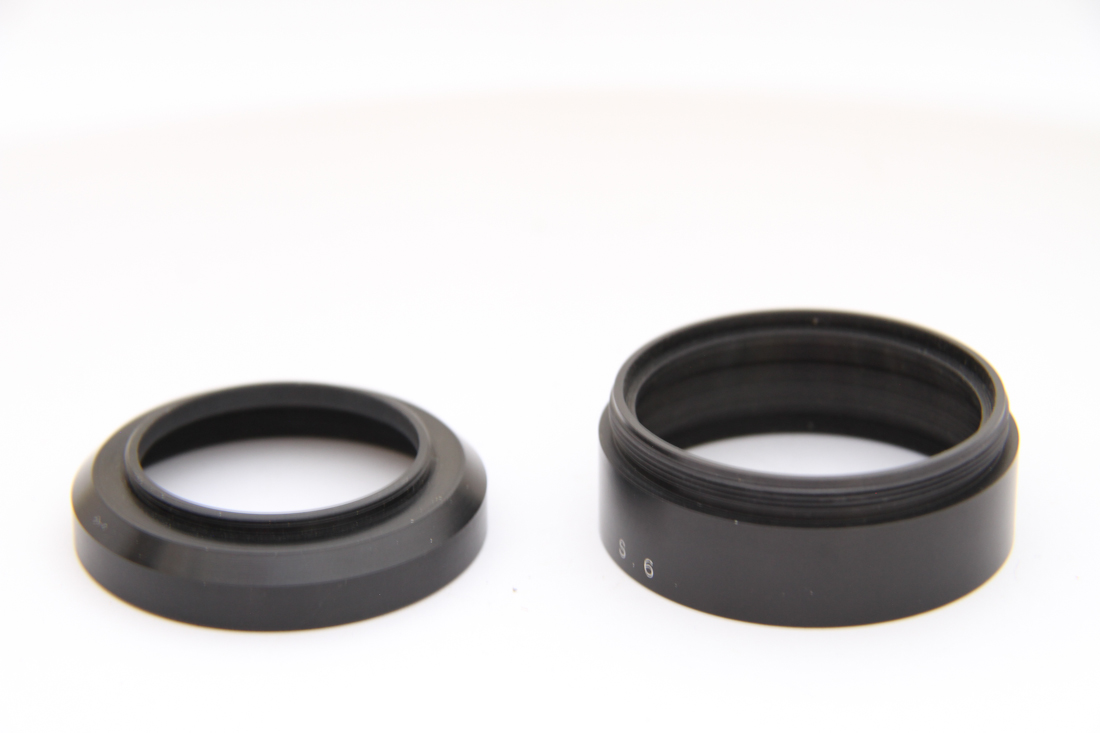 mwclassiccameras-20151119-236 Angenieux S6 35mm screw-in black metal lens hood, with removable front part (ZOOM K2) + makers red box