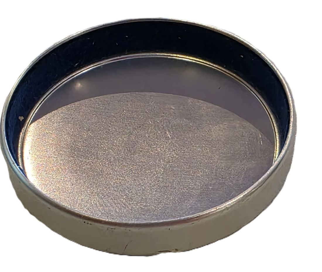20260420-48 Voigtlander 47mm push-on chrome front lens cap, with curved top. Made for the ZM lenses
