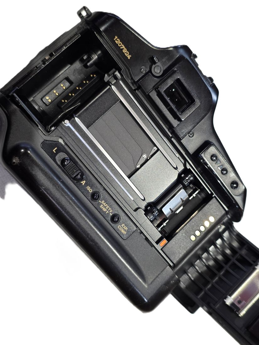 Canon T90 35mm SLR body. With built-in Motor, TTL Flash and Multi