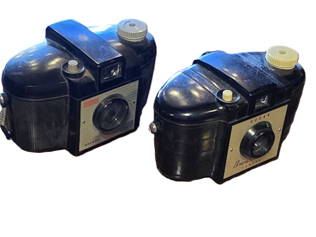 20260501-183 Set of Two Kodak Brownie 127 Cameras, Black Bakelite bodies with straps. One with Patterned front, one with Plain front