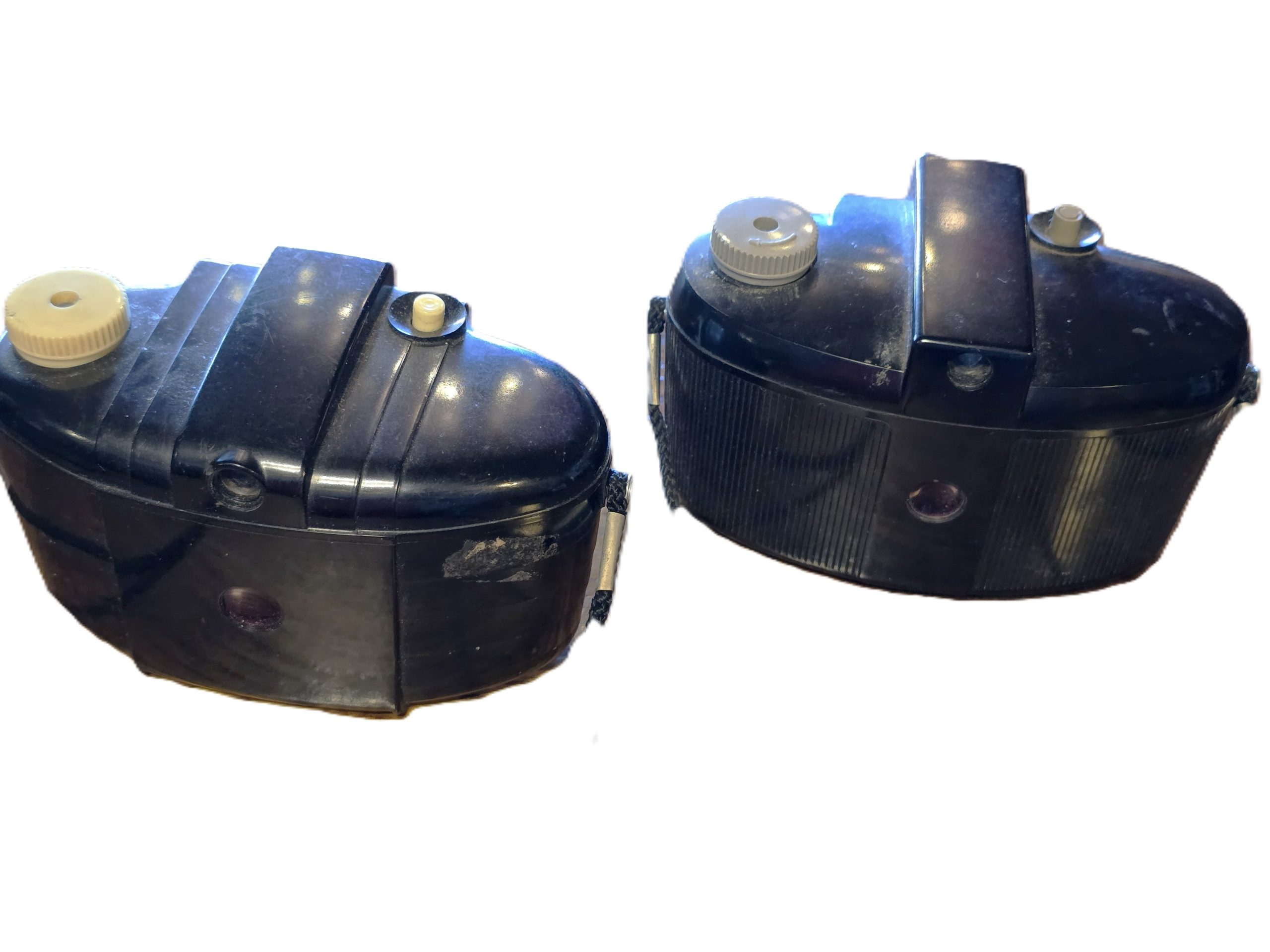 20260501-185 Set of Two Kodak Brownie 127 Cameras, Black Bakelite bodies with straps. One with Patterned front, one with Plain front