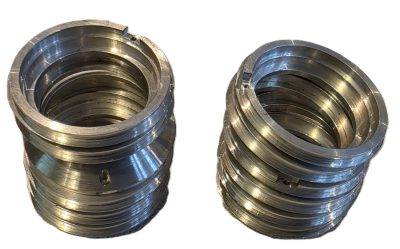 British made set of Twelve lens barrel rings, chrome. Parts from a Cooke cine lens system