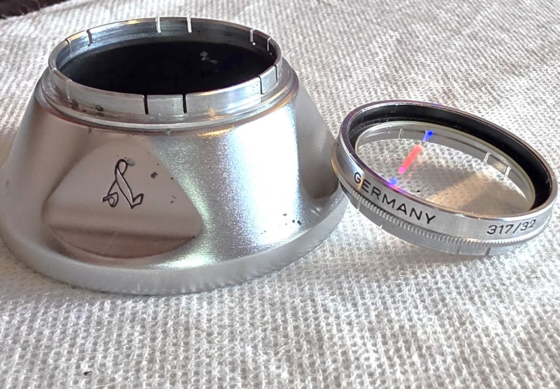 20260529-25 Voigtlander 32mm push-on chrome lens hood (310/32) + Voigtlander UV Filter (317/32)