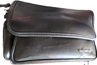 Olympus Black leatherette Camera Bag with one front & one side pocket. With Shoulder strap & inserts. 300 x 160 x 180mm