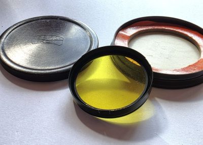 Zeiss Ikon (Un-marked) 42mm Push-on Yellow filter, black rim + Zeiss Ikon keeper case