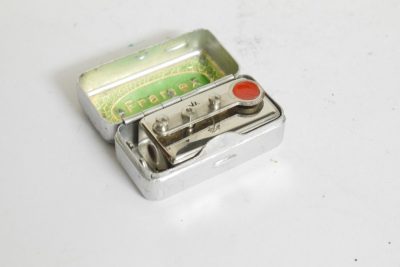 Framex mechanical clockwork self timer for L39 cameras + makers tin