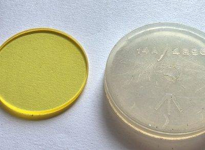 British Yellow filter glass only (37mm diameter), in British military marked plastic keeper case ("14A/4896")
