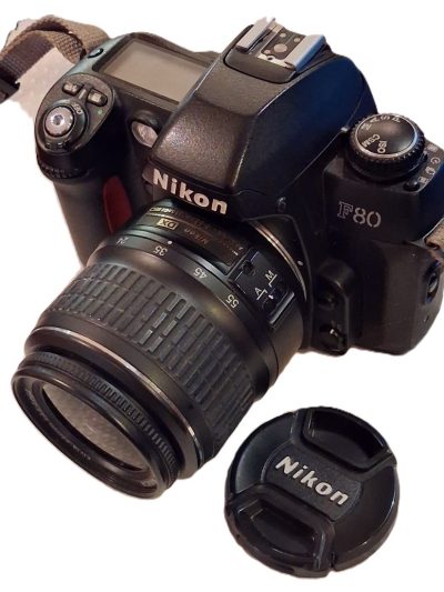 Nikon F80 35mm AF SLR + Nikon ED 18-55mm f3.5-5.6 GII zoom, with front cap, Nikon camera neck strap & Lowepro TLZ Mini case with long strap